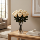 Cream long stem preserved roses styled in a vase in a modern living room